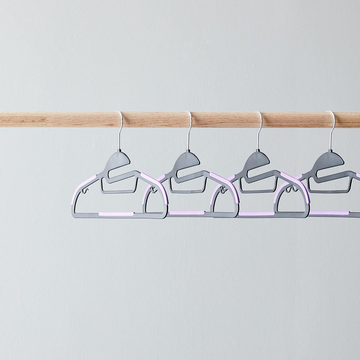 Amazon Basics Space Saving Non-Slip Rubber Coated Plastic Hangers with 360 Degree Swivel Hook, Black/Purple, Pack of 50